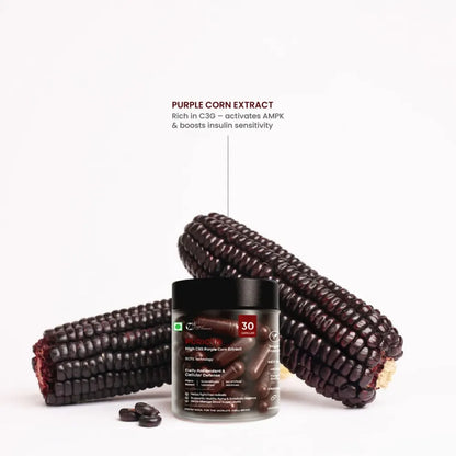 Container of purple corn extract with two ears of purple corn on a white background