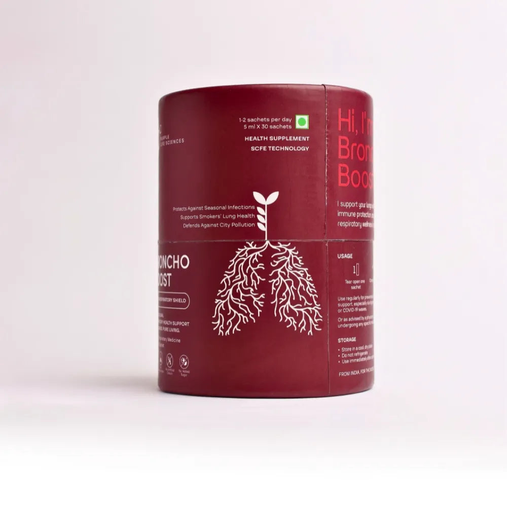 Red cylindrical container with white text and graphics on a light pink background
